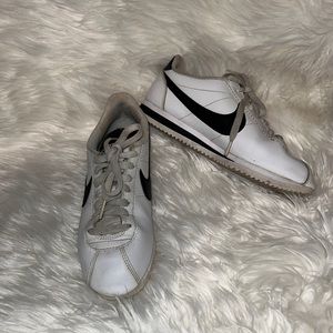 Nike White sneakers with black swoosh
